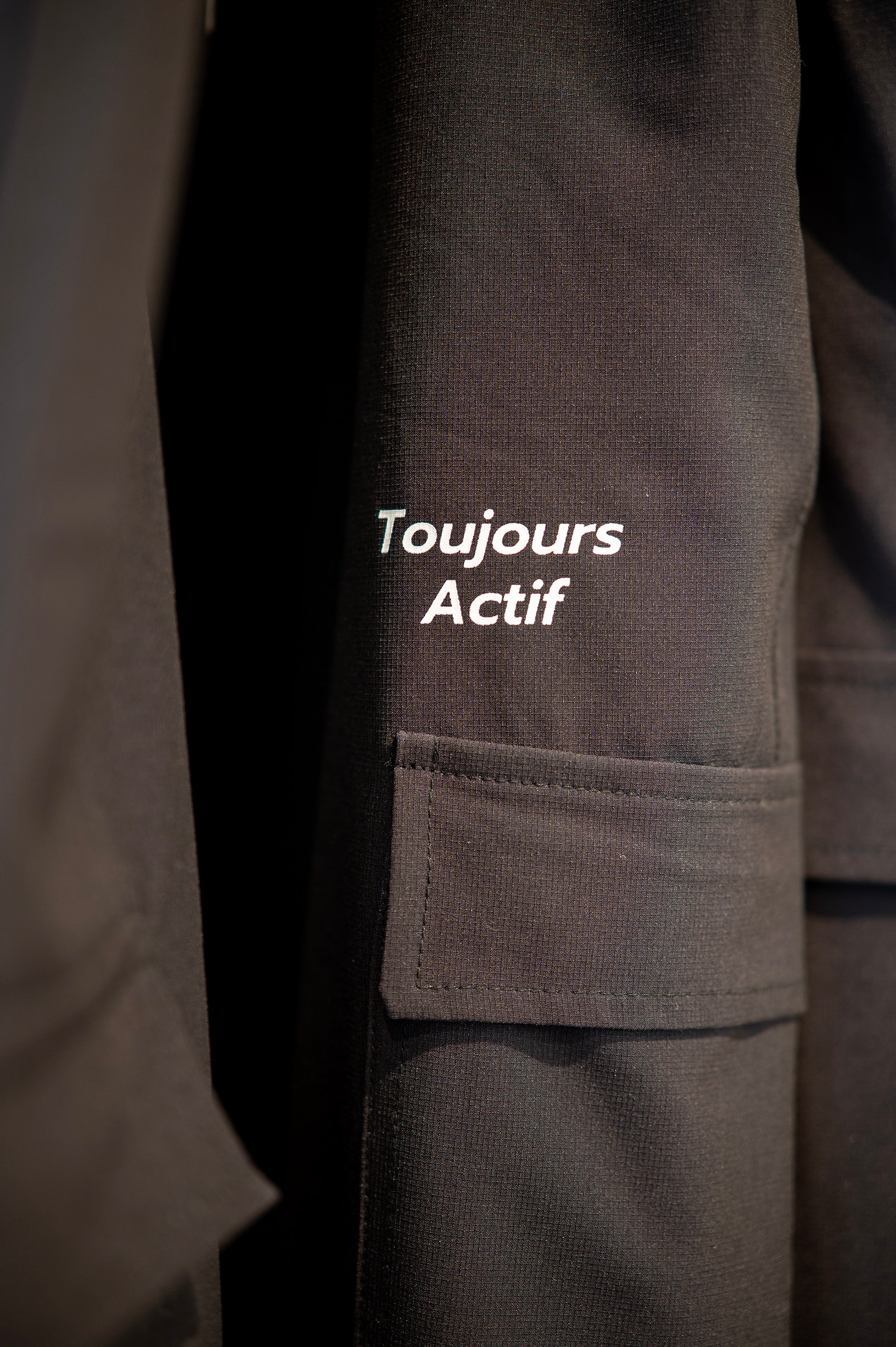 Close-up of Toujours Actif garment, highlighting quality materials and fine craftsmanship.